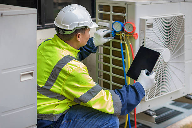 Professional Air Conditioning Repair technician working in Carmichaels, PA